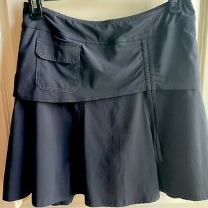 Athleta skort with attached shorts. Size 10, 20” long. EUC!